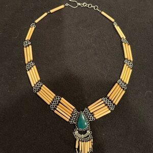 Elegant Gold and Silver Necklace with Teal Accent